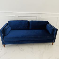 Blue velvet sofa
