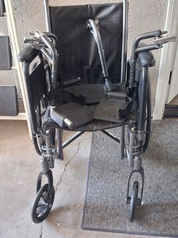 Folding Wheelchair with Footrests and Armrests
