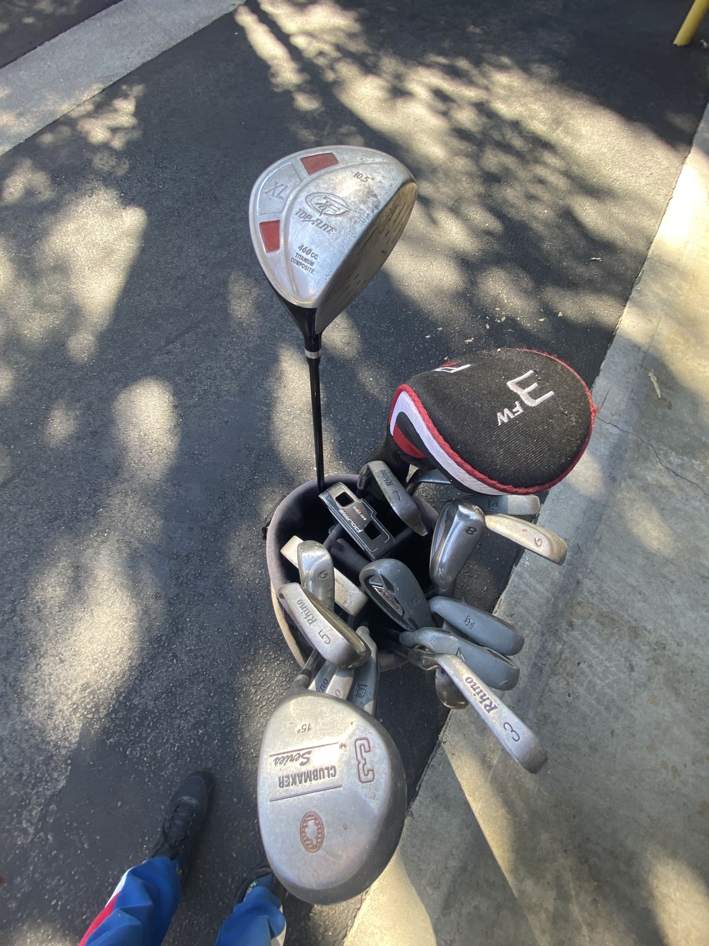 Assorted Golf Clubs