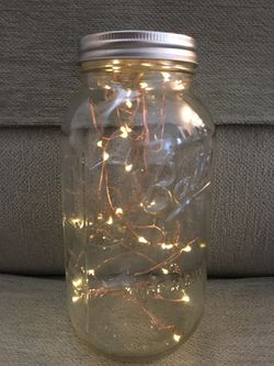 48 ounce mason jars with fire fly lights inside