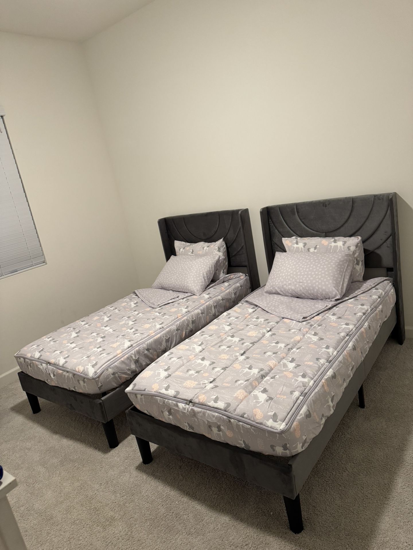 Grey Tuffed Twin Beds x2