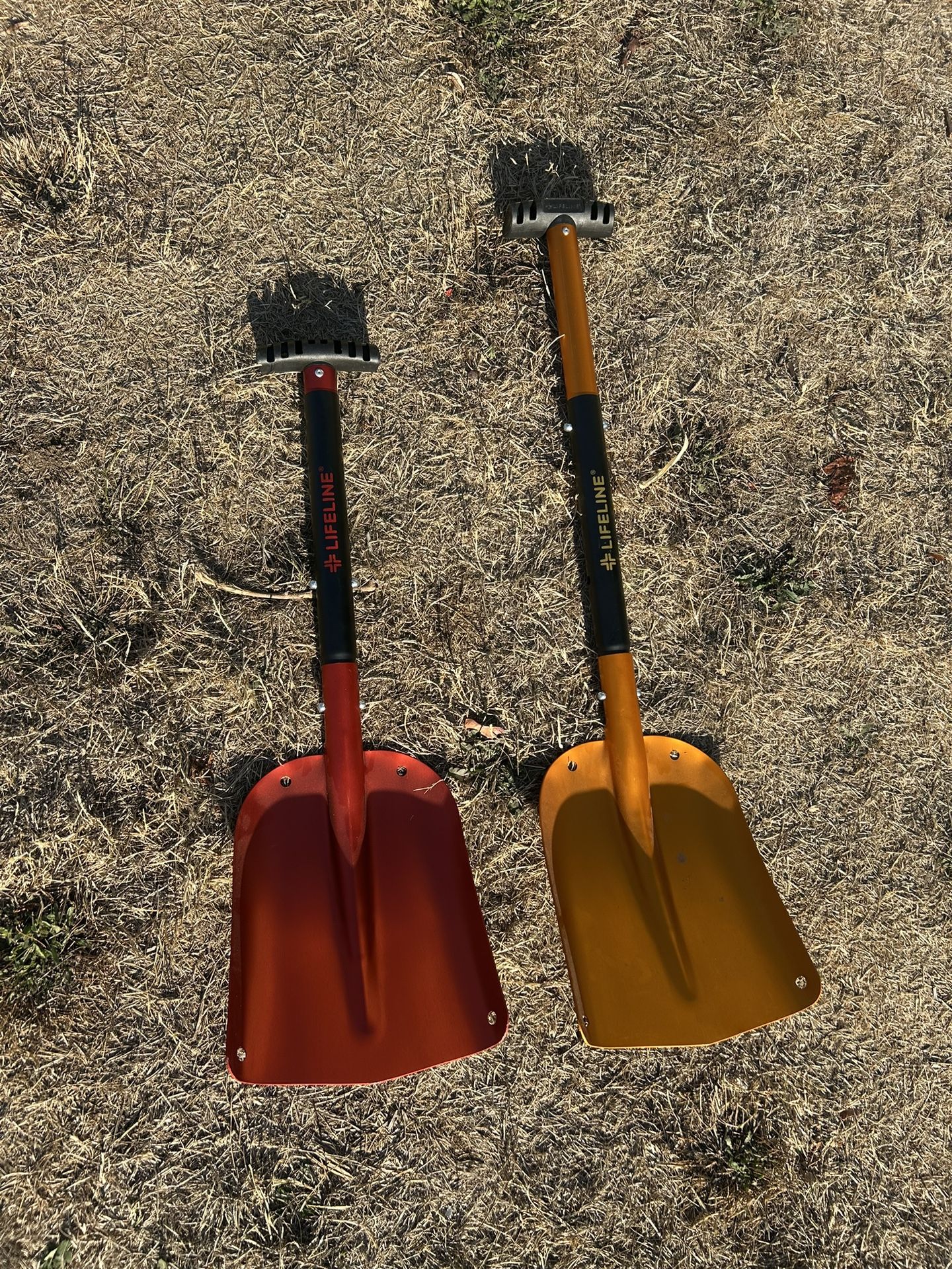 2 Lifeline collapsible shovels w/adjustable handles - never used  Both breakdown into three pieces and have adjustable length on the handle part.   $2