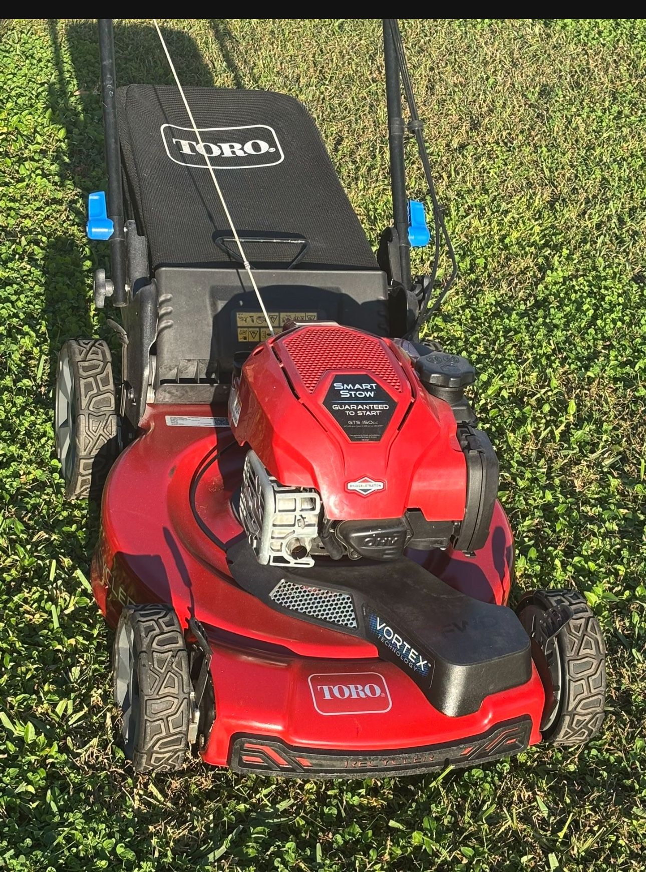 Toro smart stow self propelled lawn mower  With bagger 