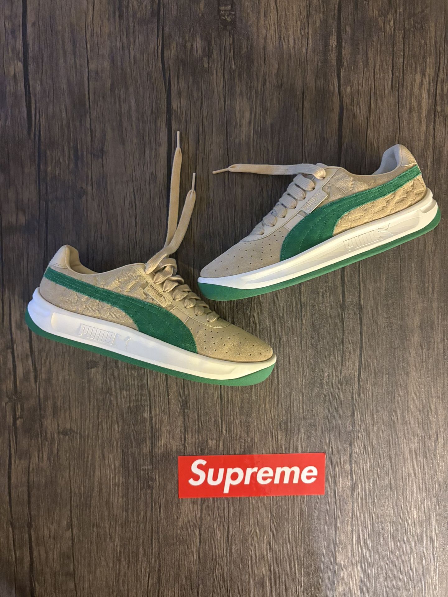 Puma Clyde trainers in green and cream