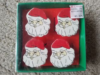 NIB 4 piece Santa Claus napkin rings