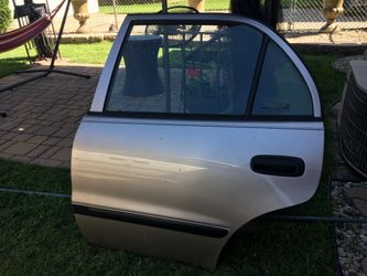 1998 Chevy Prizm LSI manual rear door driver’s side/ LH