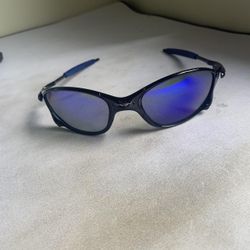 OakleyMen's Black and Blue Sunglasses(137)77