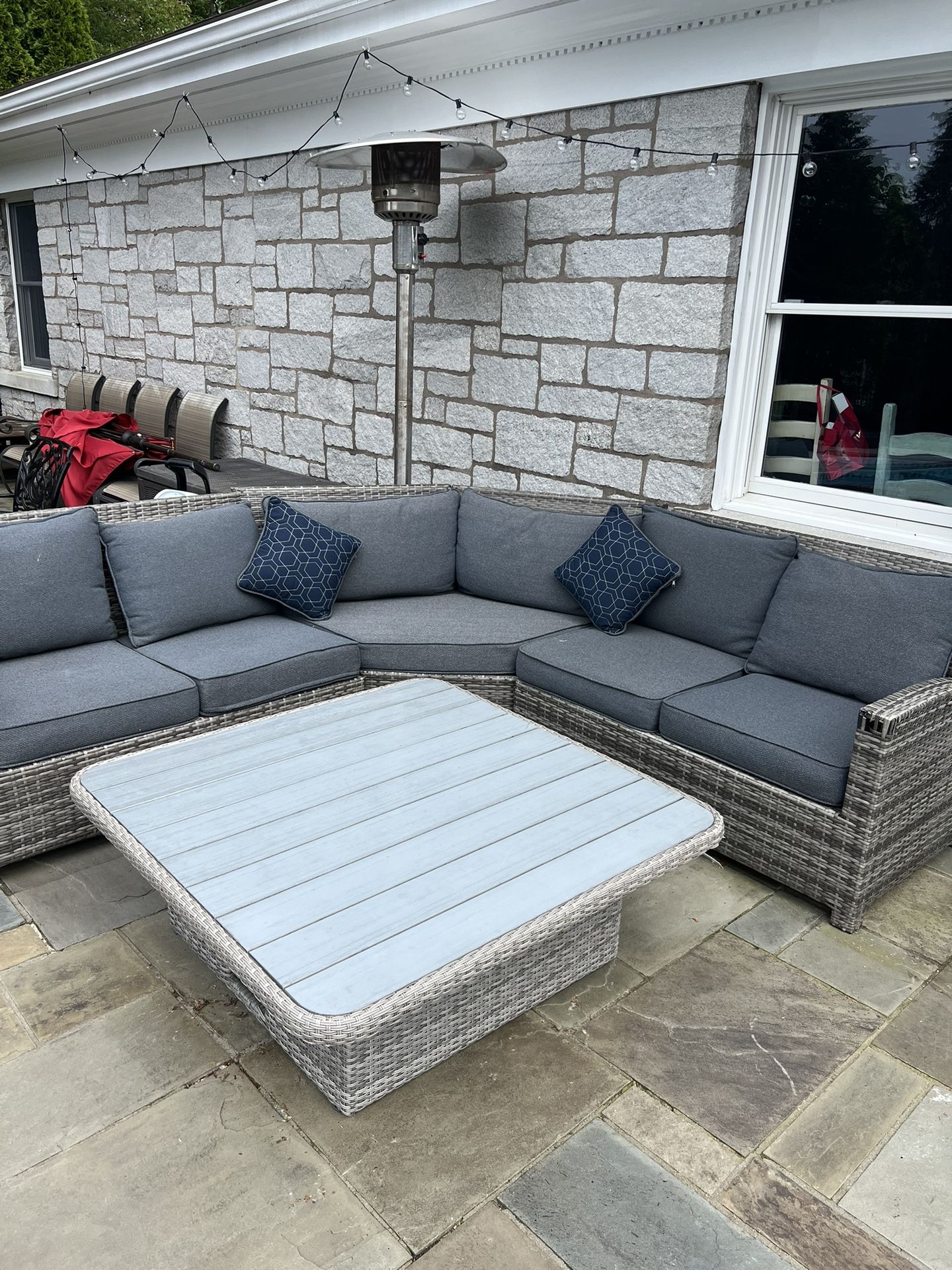 Grey Couch, Cushions, And Table
