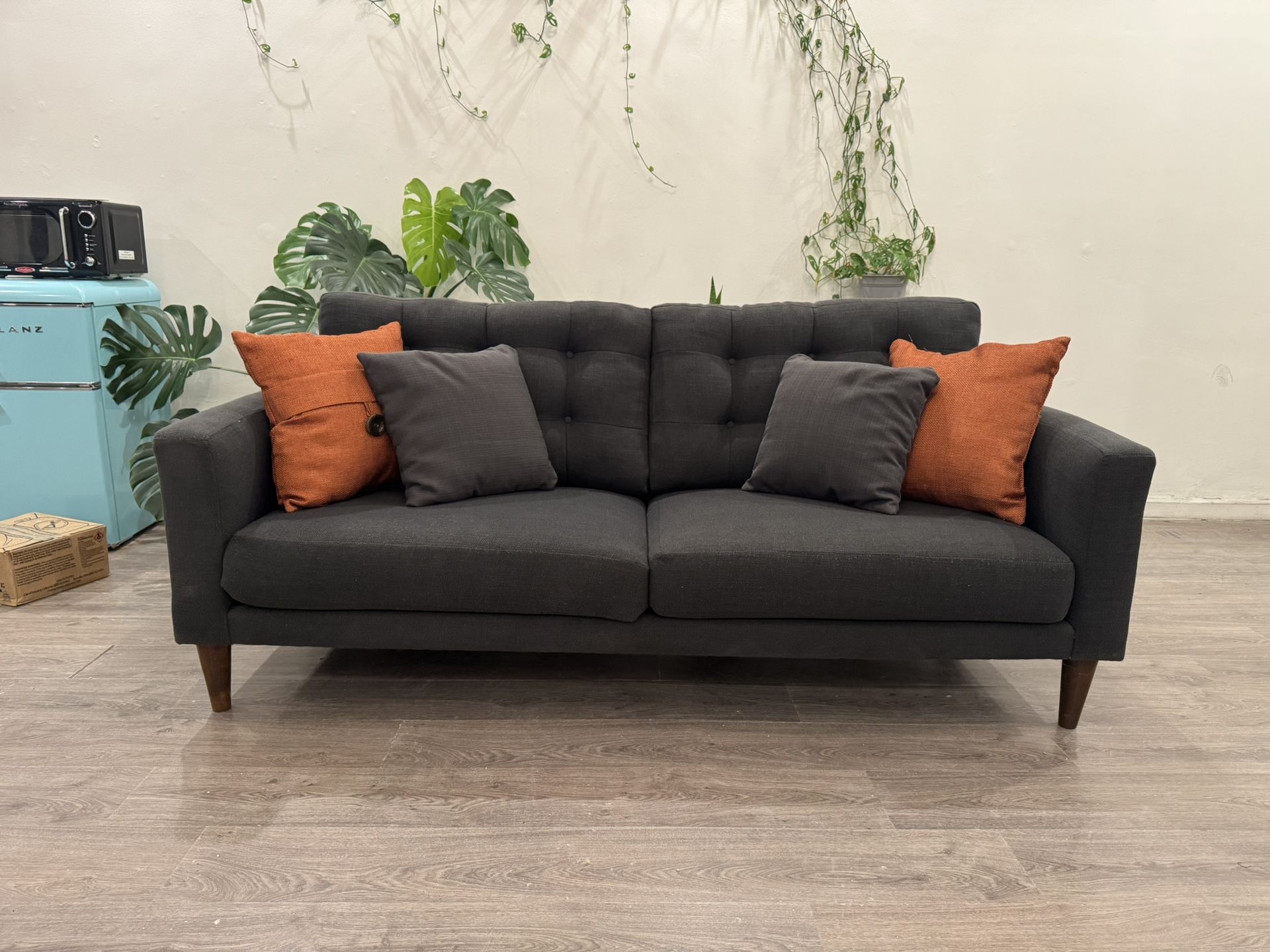 The Best Way to Clean Your Couch - AOL Mid-Century Gray Sofa