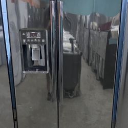 Black GE Side By Side Refrigerator  