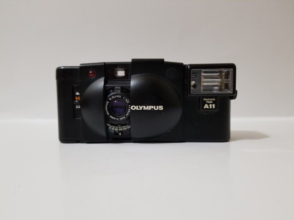 Olympus Xa2 film camera and a11 flash