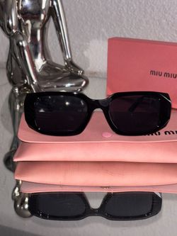 Miu Miu sun glasses