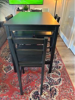 Wooden black dining table set
