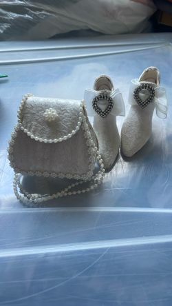 Putting  on the ritz purse and shoes 