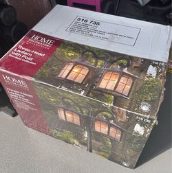 Selling an iron 3 light outdoor post lamp