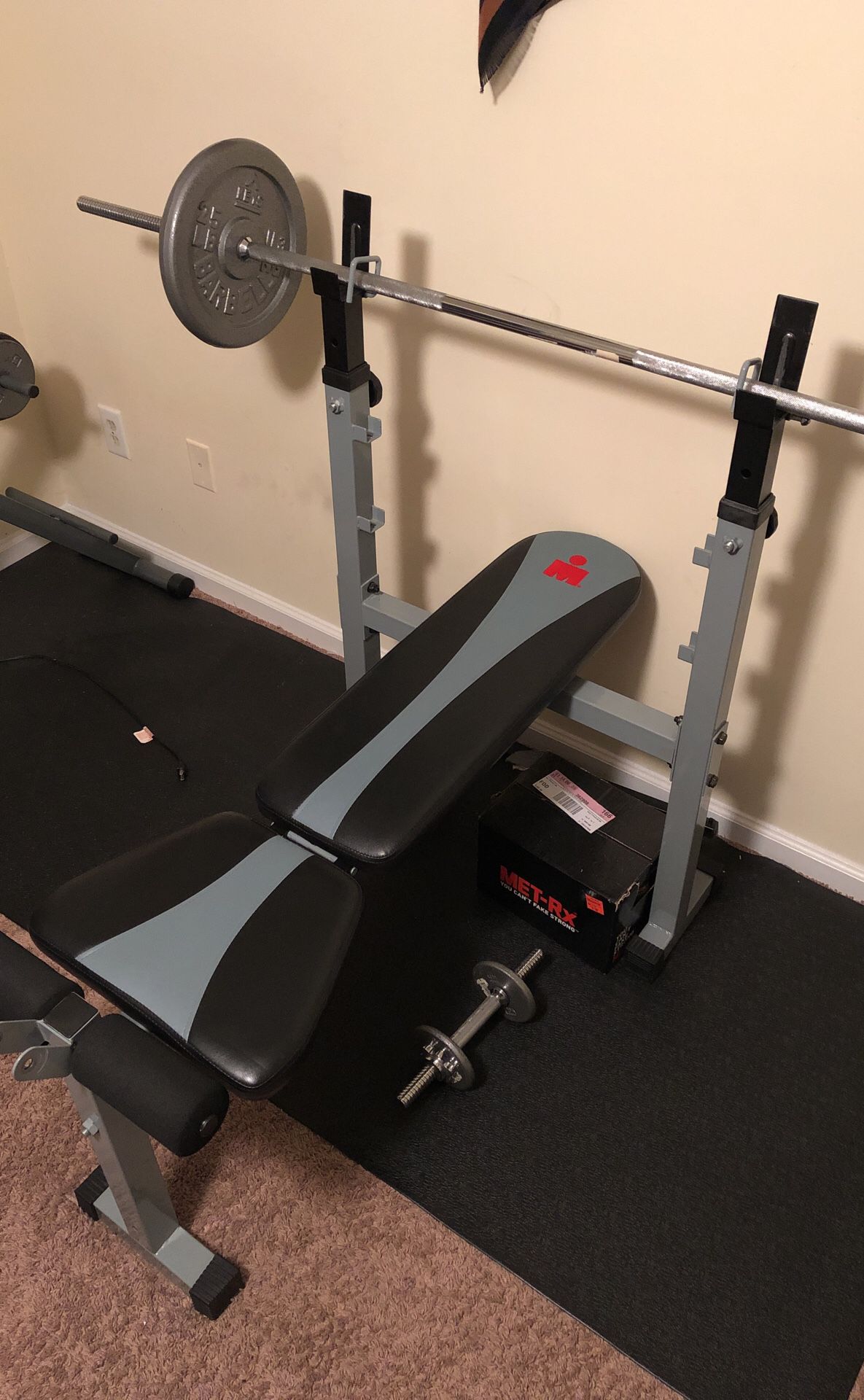 Iron Man weight Bench w/ dumbbells & 150lbs in weights