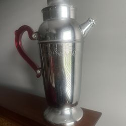 Vintage Art Deco Chrome Cocktail Shaker with Red Bakelite Handle.  Collectible