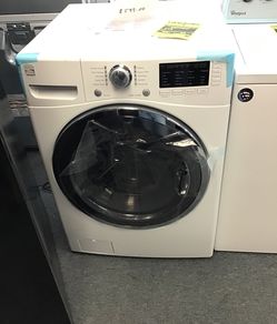 New scratch and dent kenmore front load washer. 1 year warranty