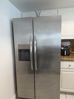 Frigidaire FRSC2333AS 36” Counter Depth Side by Side Refrigerator with External Water Dispenser