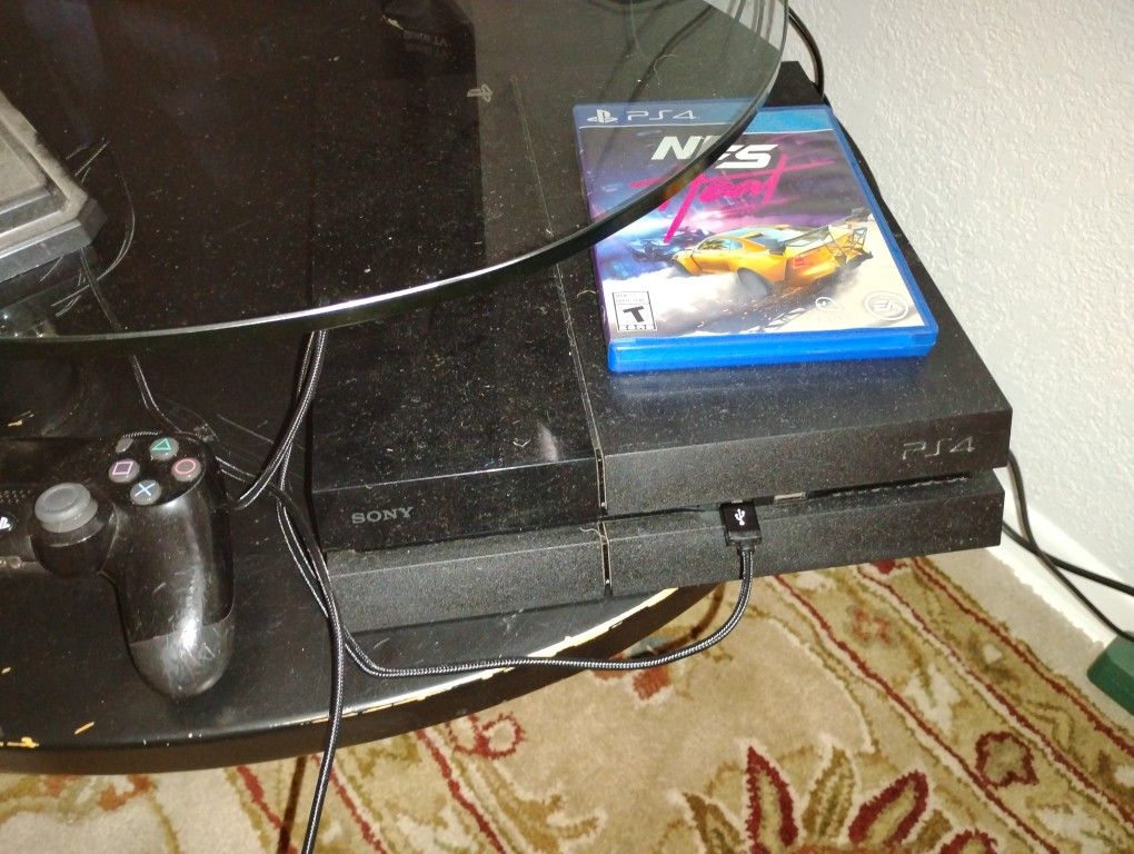 PS4 Comes With One Controller And One Game Need For Speed And Comes With Power Cord And HDMI Cable All Ready To Play 
