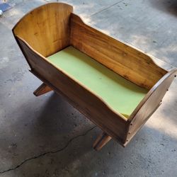 Beautiful wood crafted baby/doll cradle. 