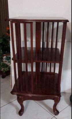 Antique revolving bookcase or Bar.