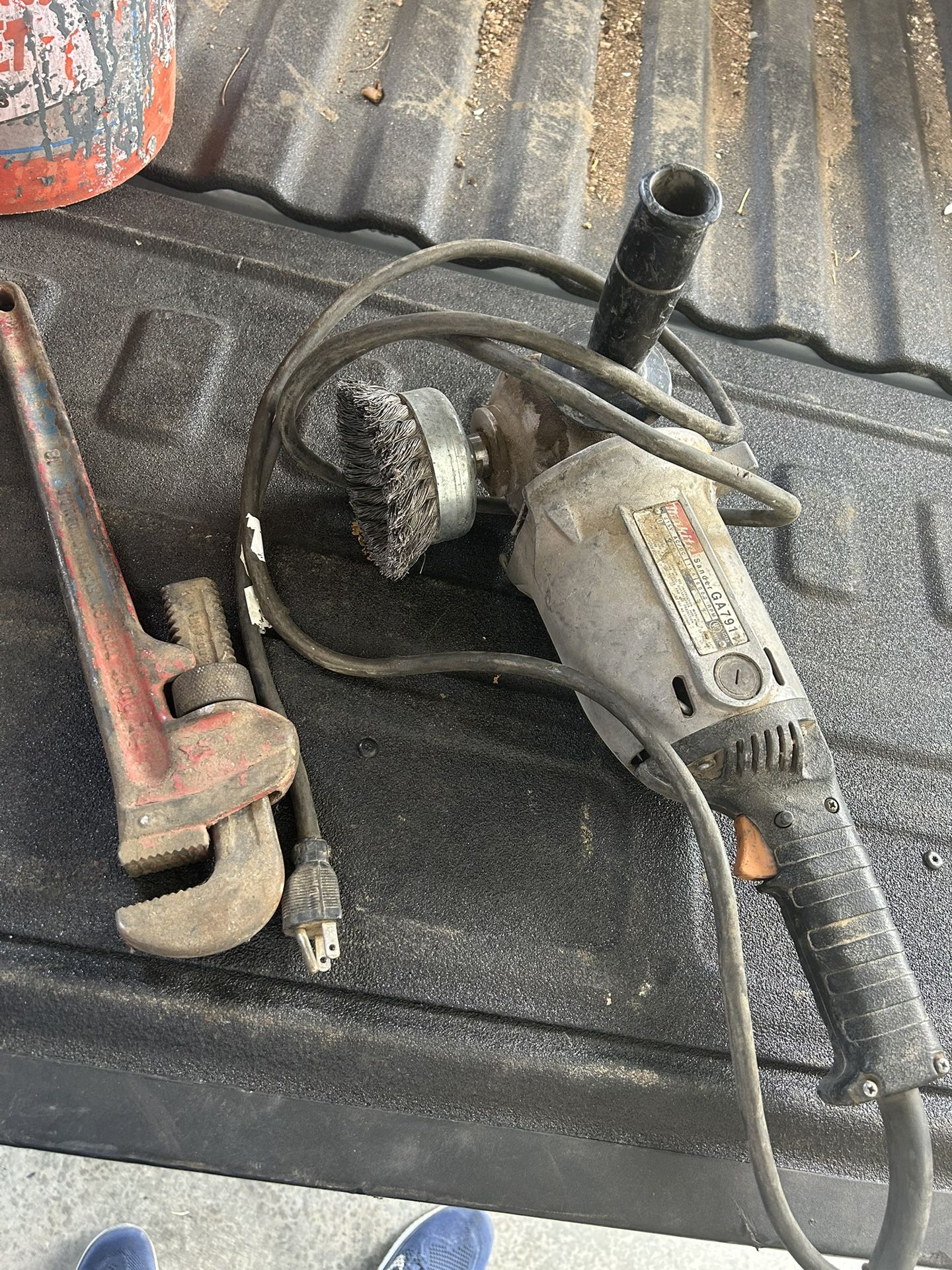 Angle Grinders And Pipe Wrench