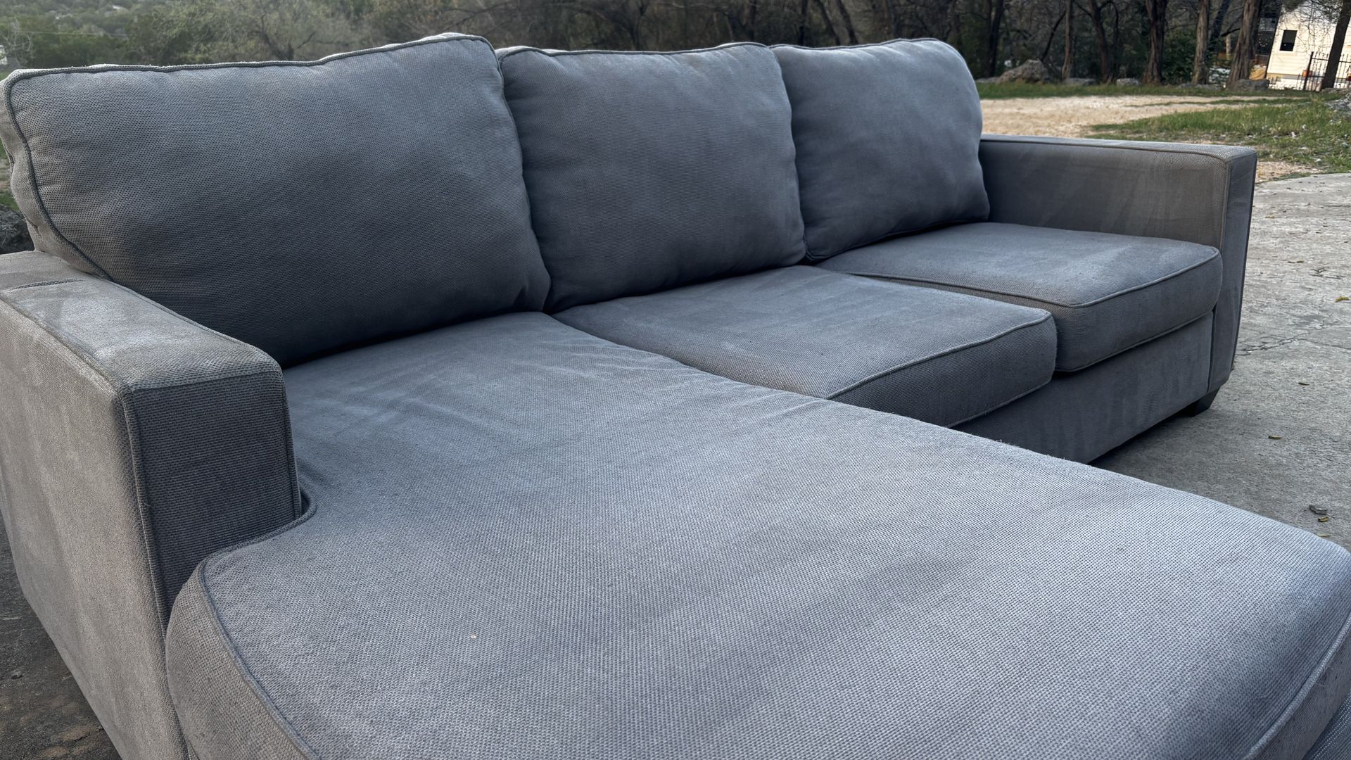 *FREE DELIVERY* Living Spaces Gray Reversible Sectional
