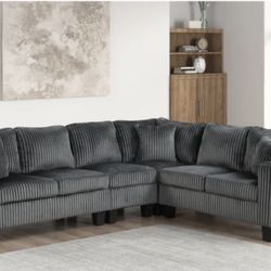 New  Grey Reversible Sectional With Free Delivery 