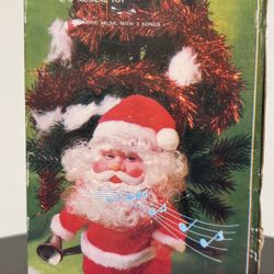 vintage, battery-operated musical walking Santa Claus toy, item number S-150.  