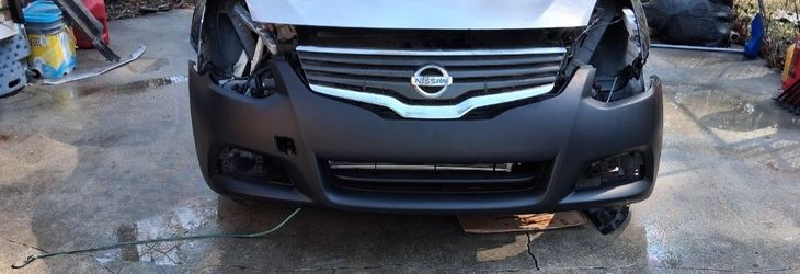 2012 Nissan altima SR front bumper brand new in the plastic