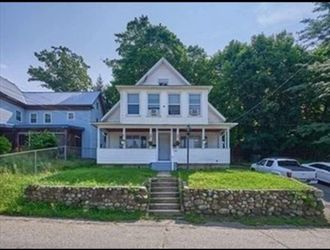 Two-Story White Victorian House