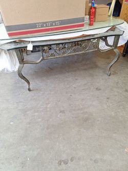 Glass top cast iron table