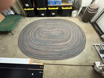 Braided oval shaped rug