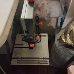 Stationary Band saw.    And Force Hurcles Jackhammer 