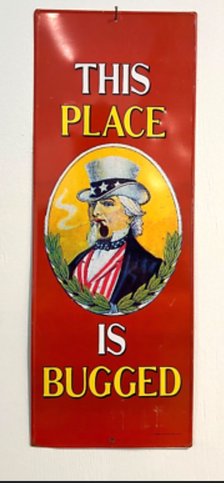 “This Place Is Bugged” Metal Sign