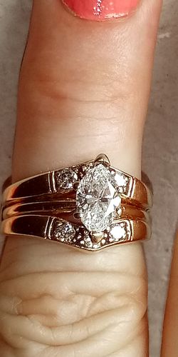 14k marques 1.40ct center .14k ring guard .25 point diamond