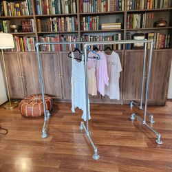 Industrial pipe hanging rack for clothing closet