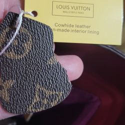 Louis vuitton, grape purse.