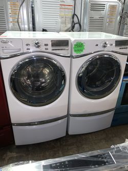 WHIRLPOOL front load washer and matching electric dryer in excellent conditions with 4 months warranty