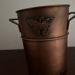 Butterfly metal bucket