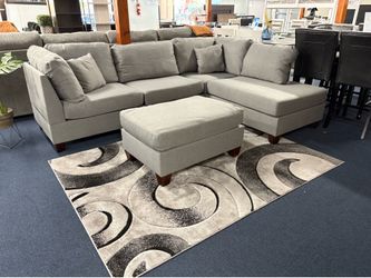 Grey reversible sectional W/ ottoman
