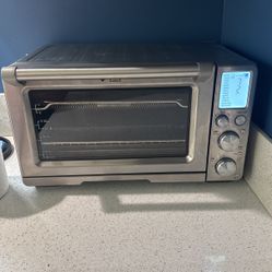 Breville Air Fryer with multiple cooking settings.