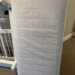 Free crib mattress + sheets 