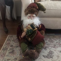 European Large Santa Sits On Couch