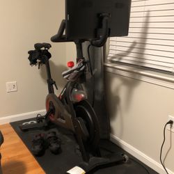 Peloton with mat and Size 10 Men’s Peloton Shoes. 