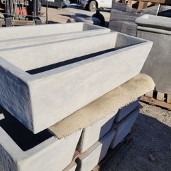CEMENT PLANTER POTS  $200 EACH