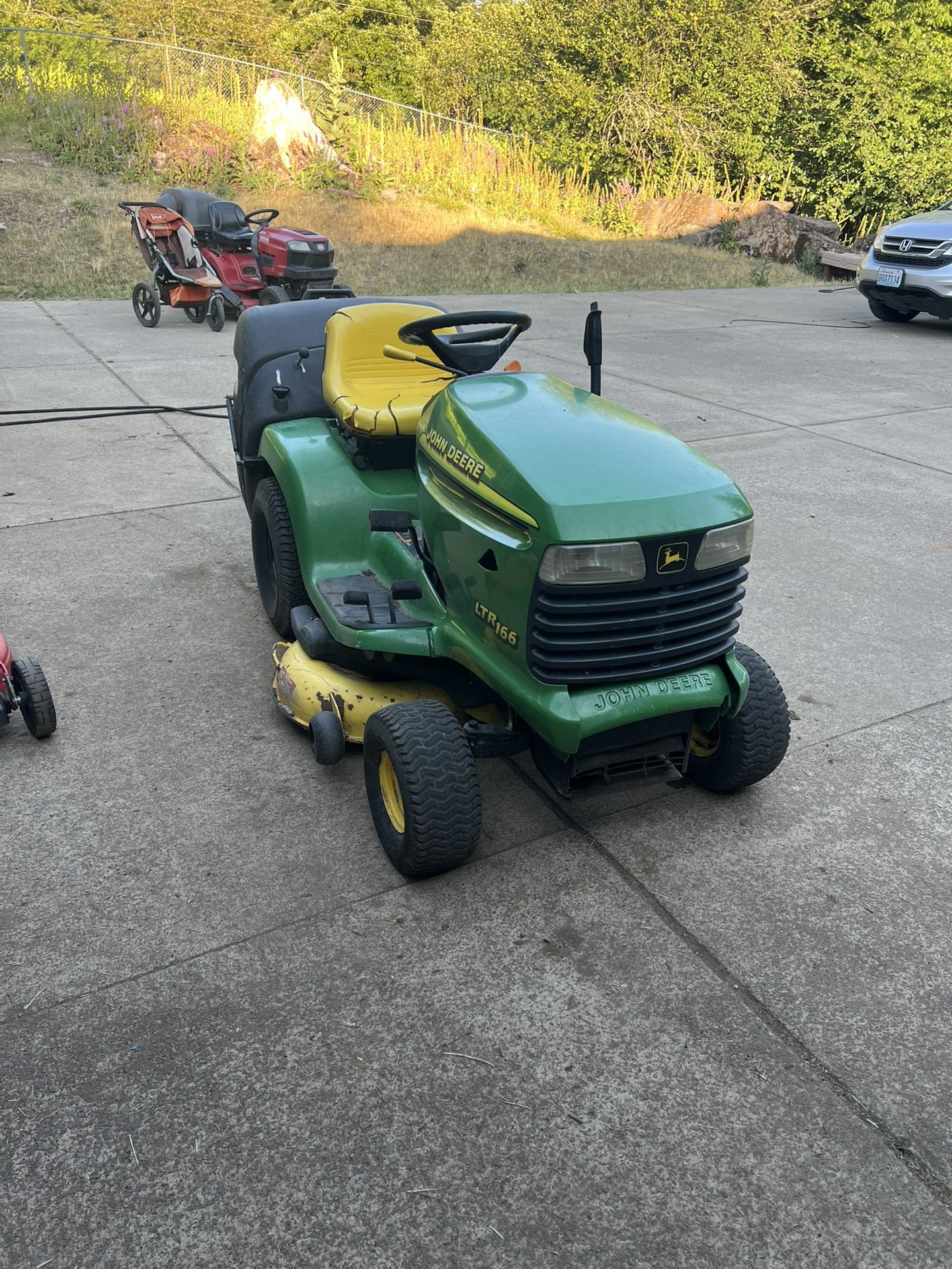 John Deere Riding Lawn Mower With Bagger