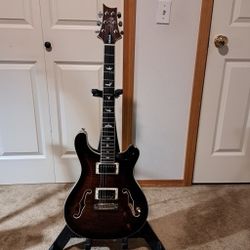 Yellow ERIC Johnson Stratocaster And Brown Is PRS SE Hollow Body