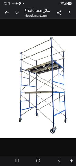Rolling scaffold 15' high.